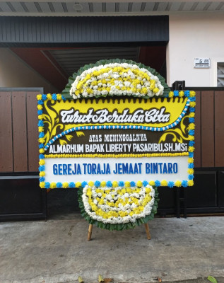 Papan Bunga Duka di Sudajayagirang